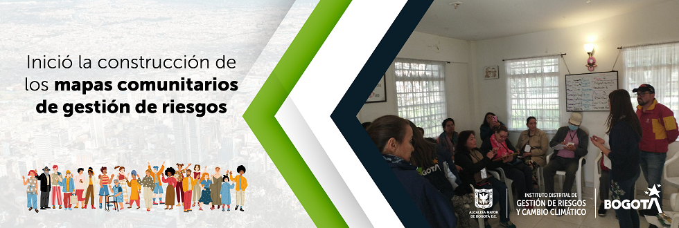 Grupo de personas en mesa de trabajo IDIGER